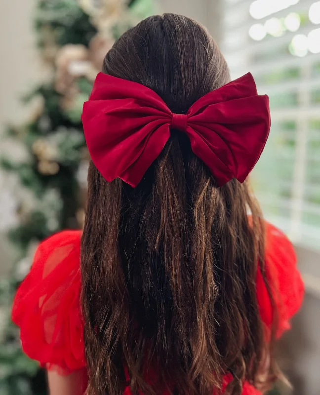 classic fit-and-flare dressLarge Red Satin Christmas Bow